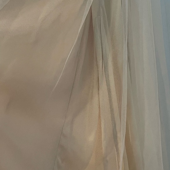 Long sheer ivory gown with lace bodice. - Picture 9 of 10